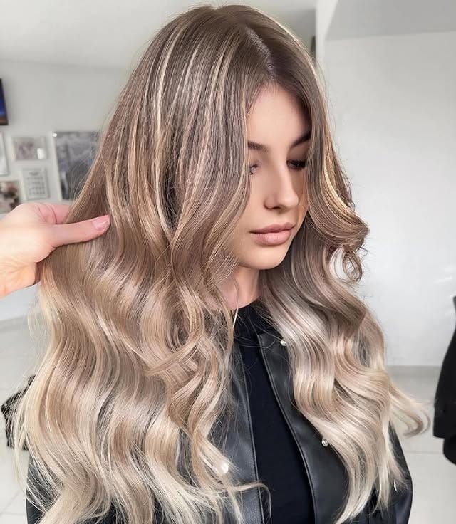 19. Creamy Ash Beige Balayage with Polished Waves - Ash Blonde Balayage