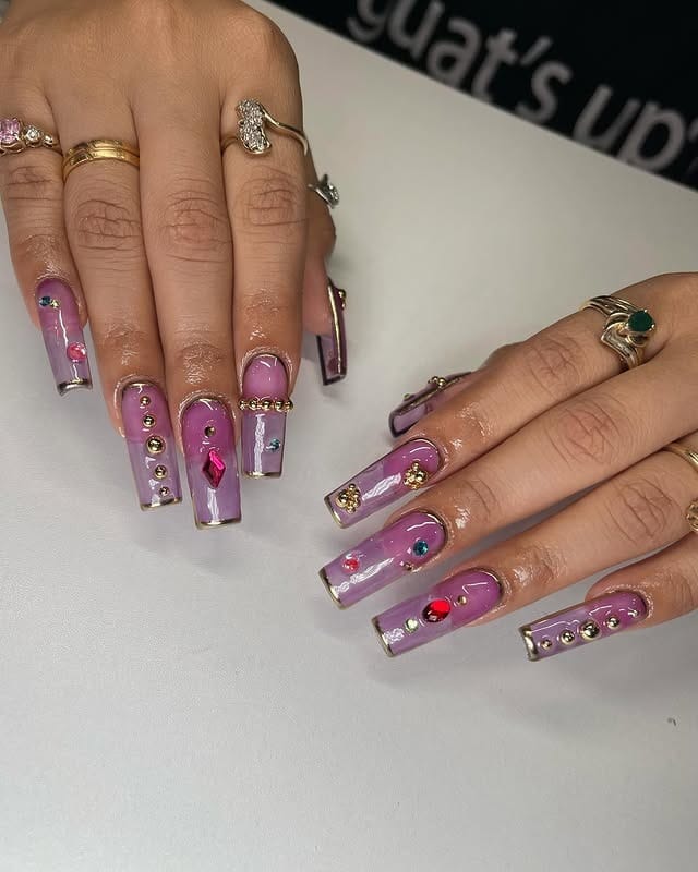 2. Royal Gemstone Glam - purple and gold nail ideas