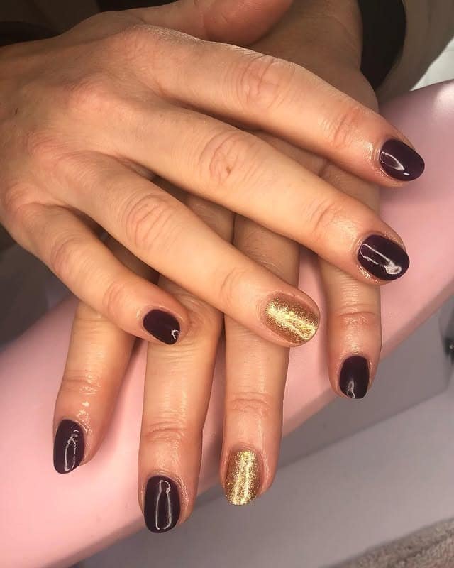 6. Midnight Gold Accent Duo - purple and gold nail ideas
