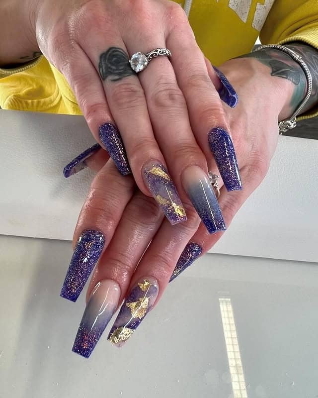 9. Royal Violet Fade with Gold Leaf - purple and gold nail ideas