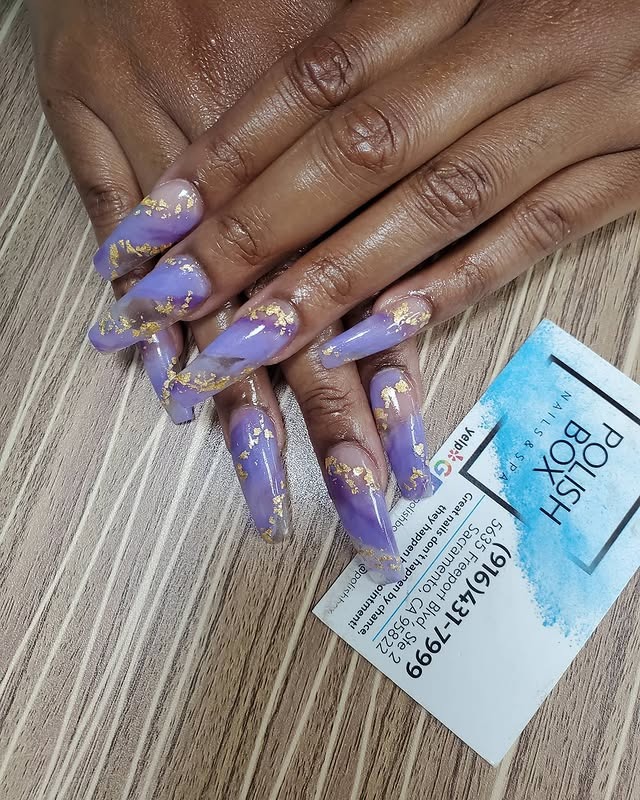 15. Golden Amethyst Swirl - purple and gold nail ideas