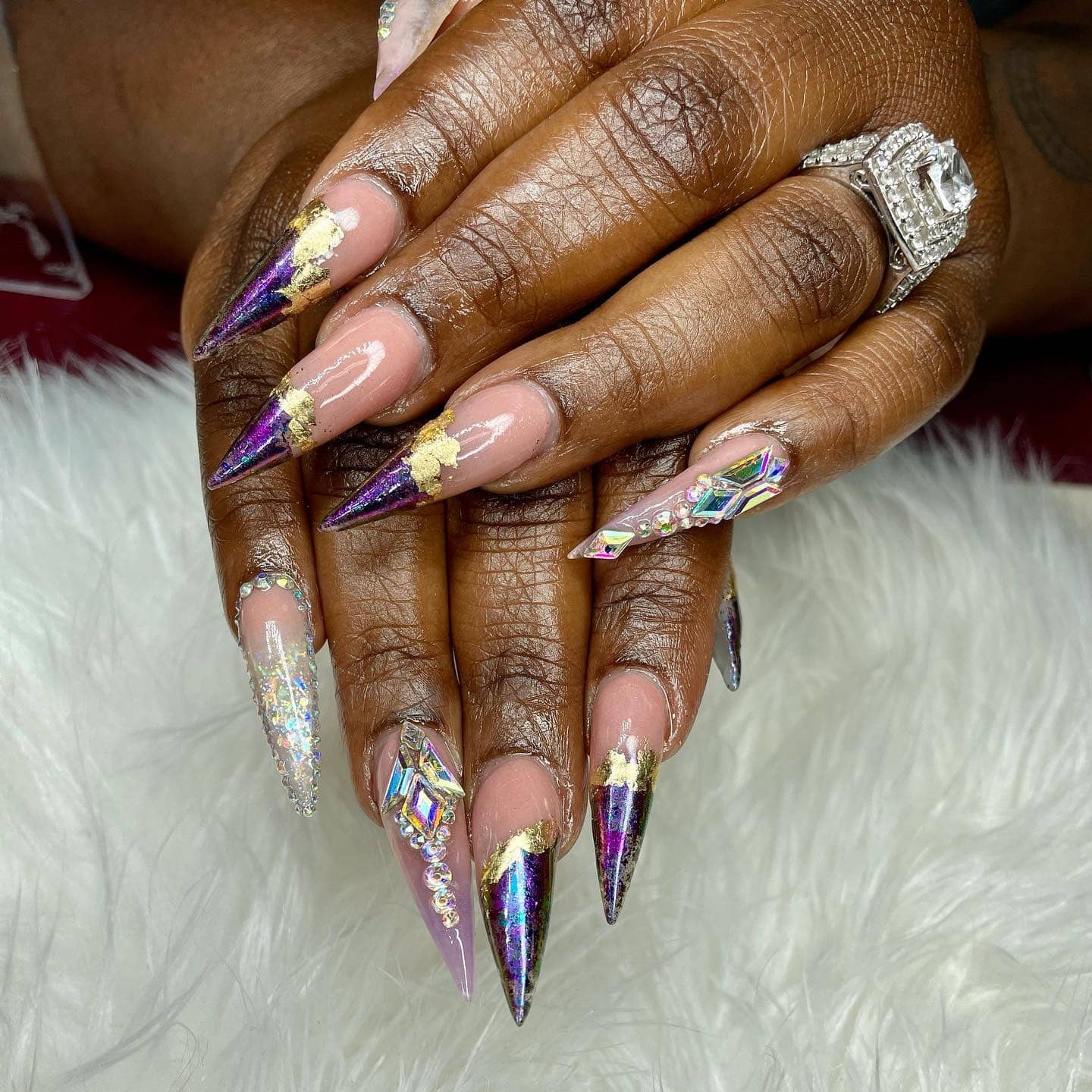 17. Gilded Purple Points - purple and gold nail ideas