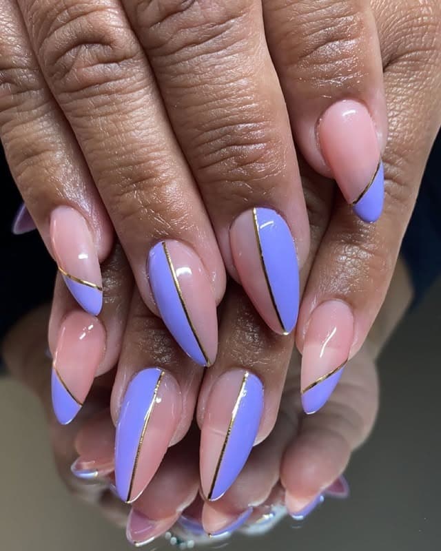19. Pastel Perfection with Gold Lining - purple and gold nail ideas