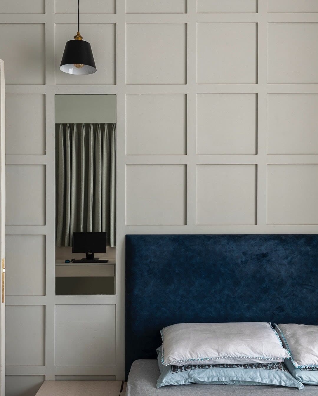 1. Modern Grid Elegance in Soft Gray and Midnight Blue - gray and blue bedroom ideas