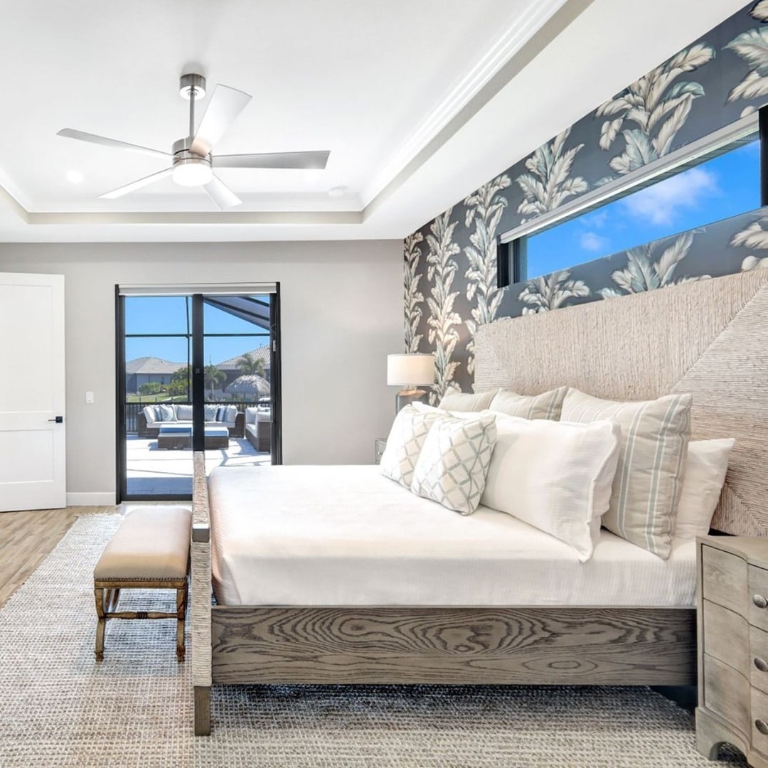 4. Tropical Gray-Blue Escape with Botanical Drama - gray and blue bedroom ideas