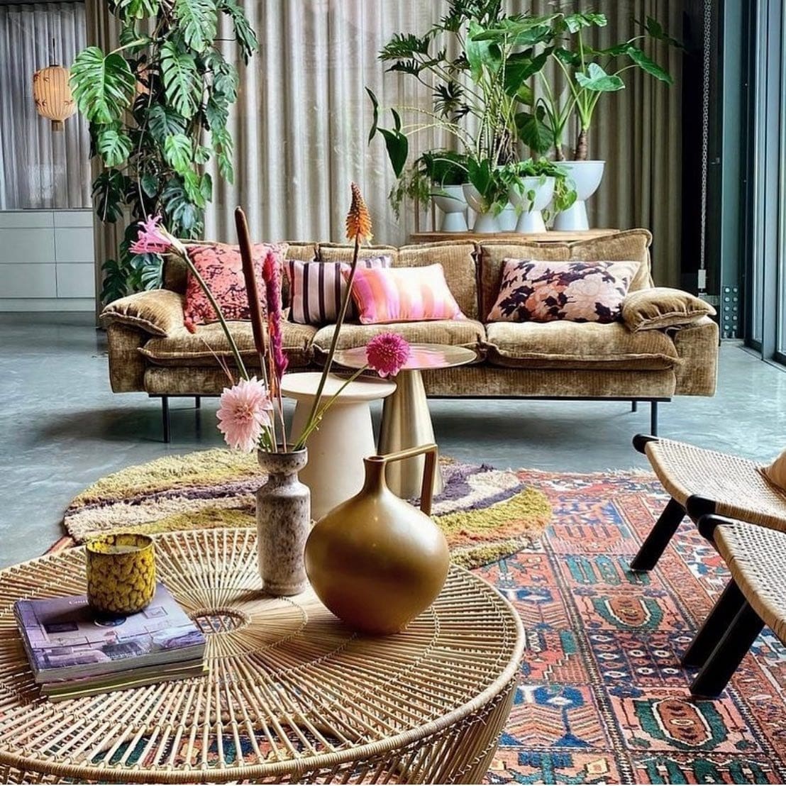 3. Boho Glamour with Botanical Accents - brown and gold living room ideas
