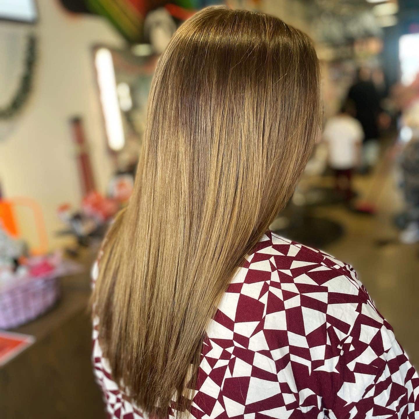 1. Sleek Dark Blonde Perfection - Dark Blonde Hair Color