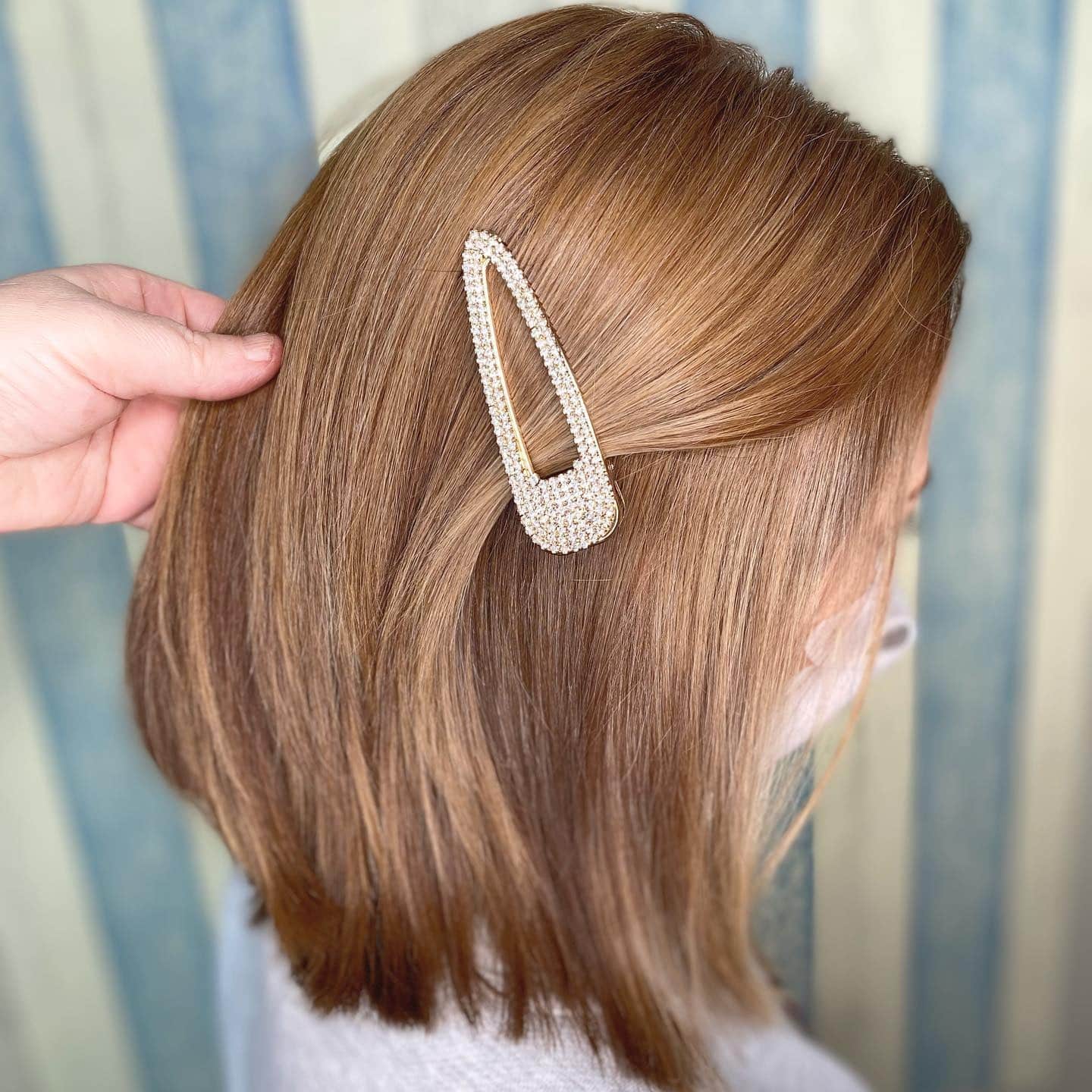 6. Polished Caramel Blonde Bob - Dark Blonde Hair Color