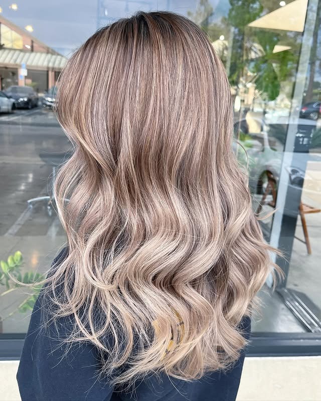 20. Smoky Beige Dark Blonde Waves - Dark Blonde Hair Color