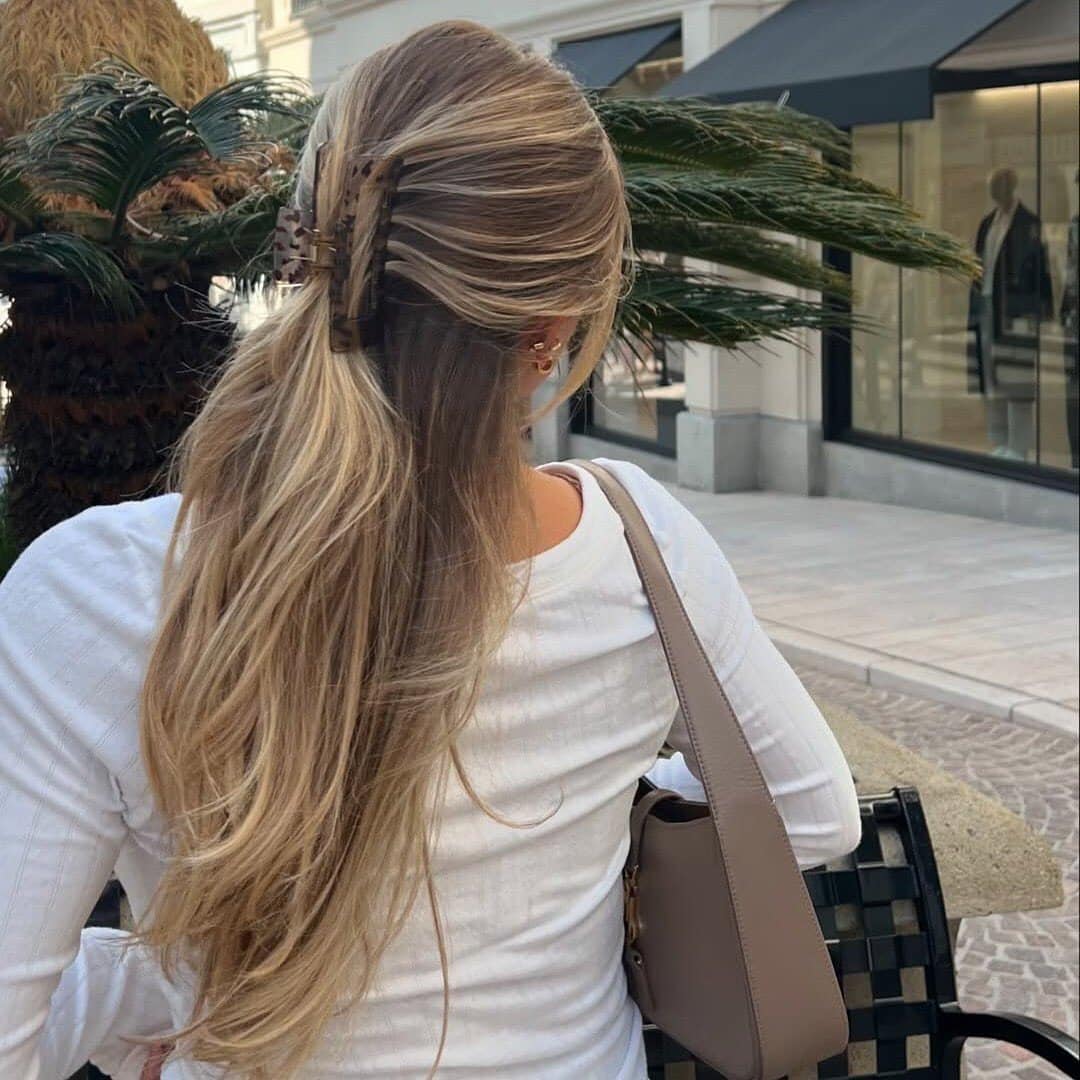 9. Toffee Blonde Claw Clip Sweep - Fall Hairstyles