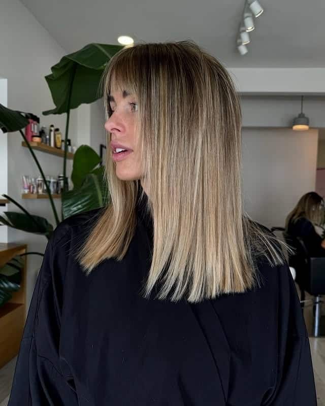 20. Champagne Blonde Sleek Cut with Fringe - Fall Hairstyles