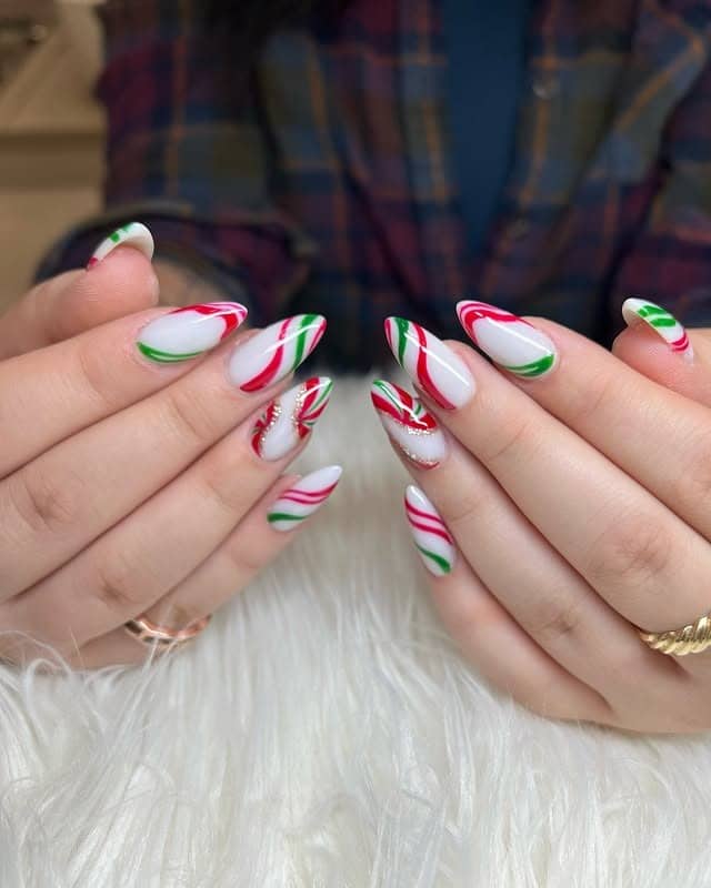 17. Candy Cane Swirl Tips - red and green nail ideas