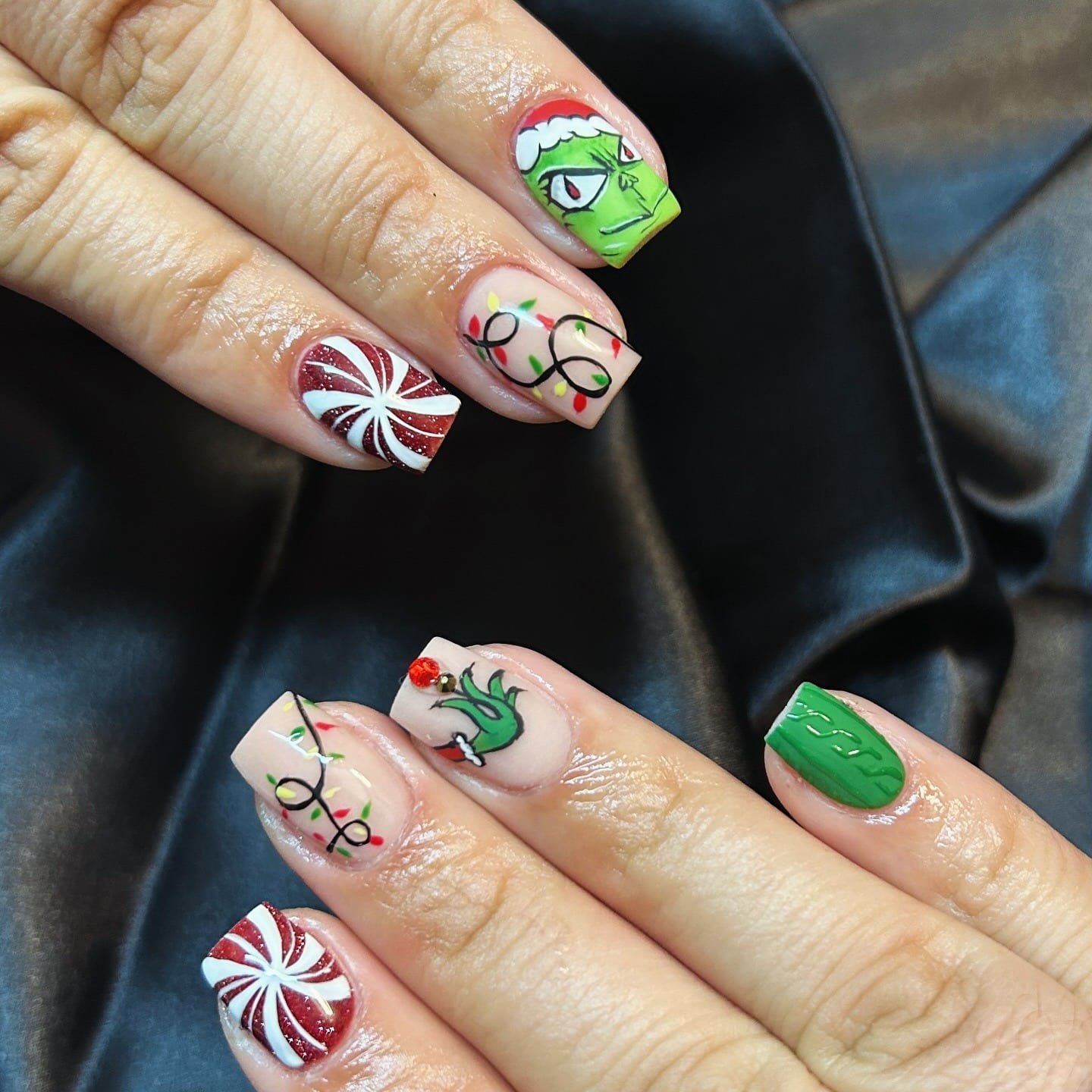 22. Peppermint Grinch Nails - red and green nail ideas