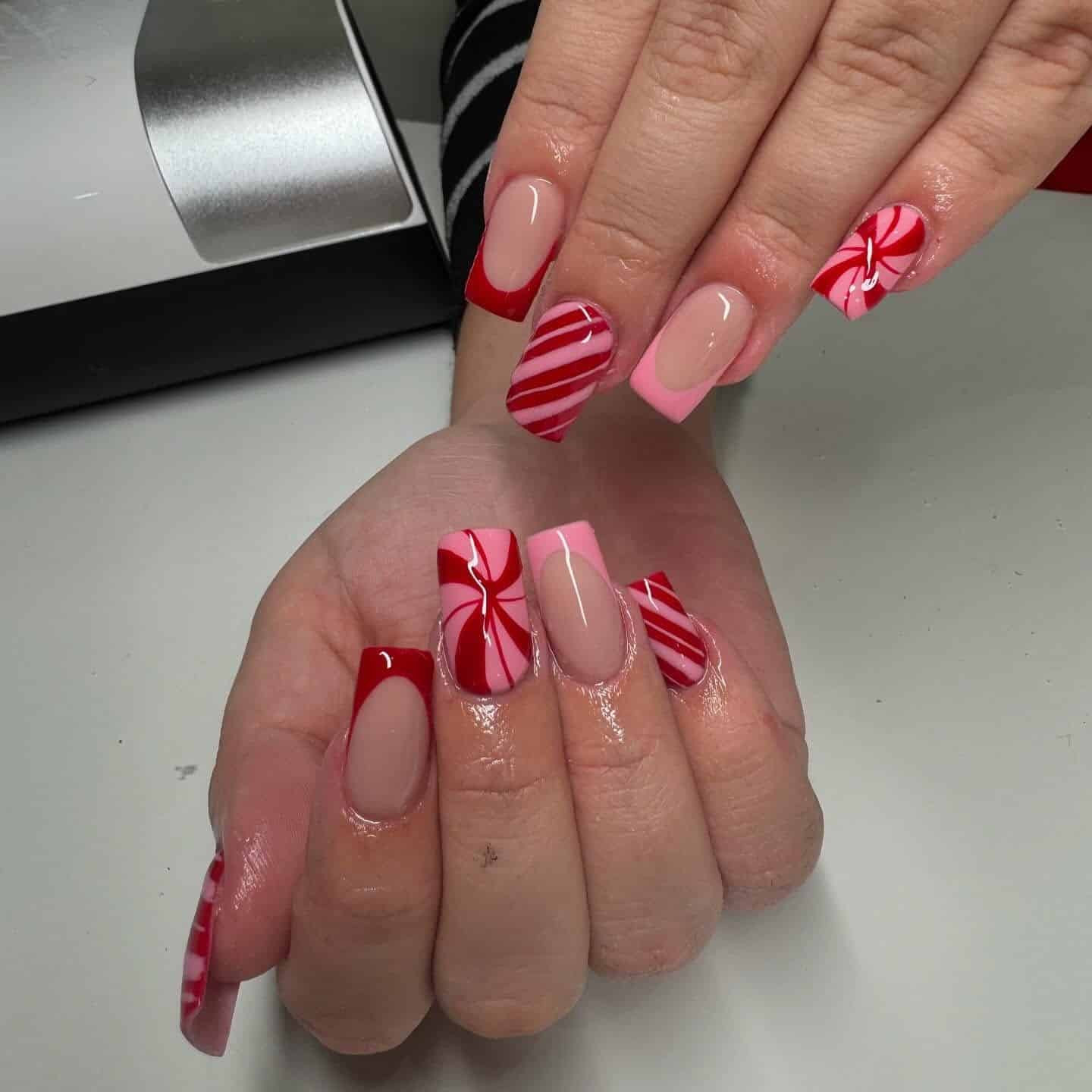 4. Candy Swirl Fusion - red and pink nail ideas