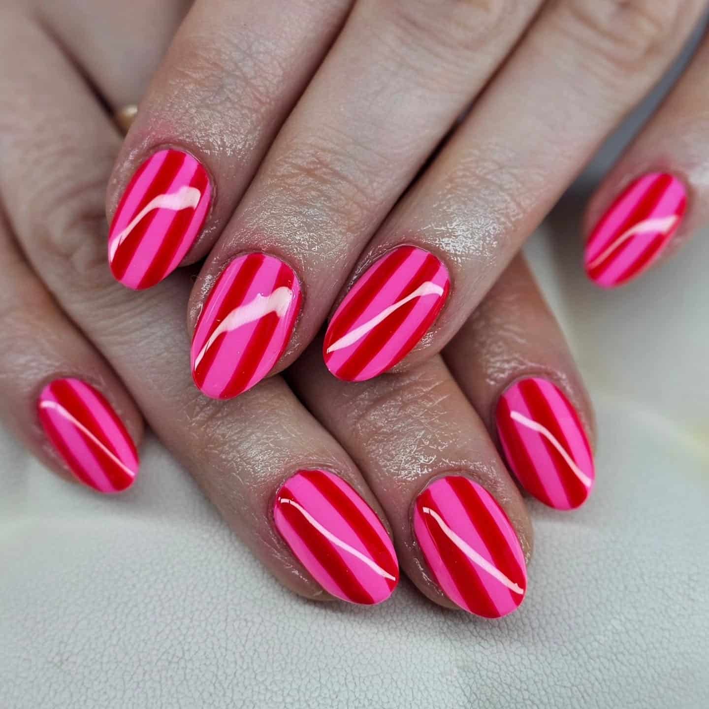 11. Candy Stripe Chic - red and pink nail ideas