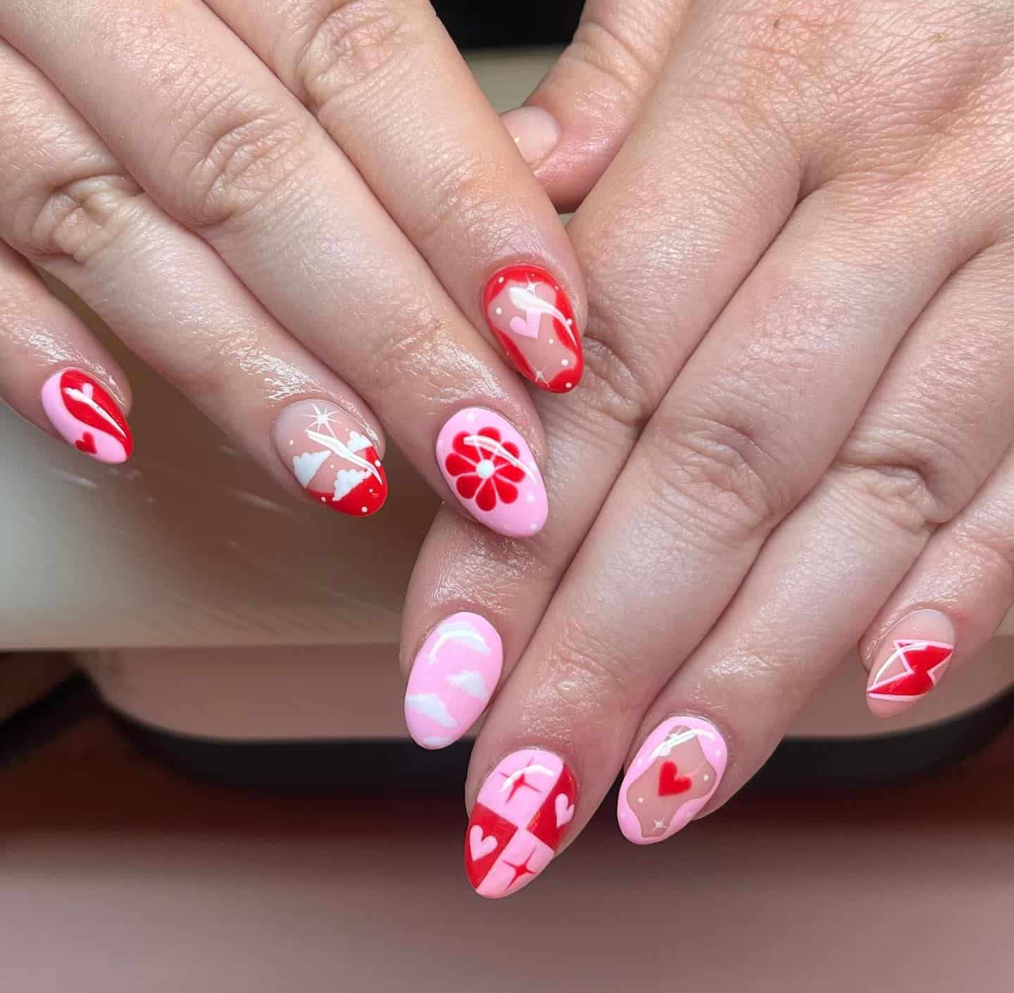 15. Whimsical Heart Mix - red and pink nail ideas