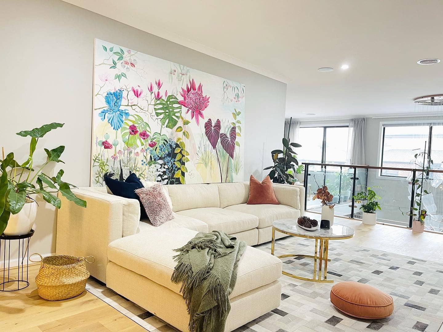 8. Artful Bloom with Vibrant Oversized Florals - large living room wall ideas