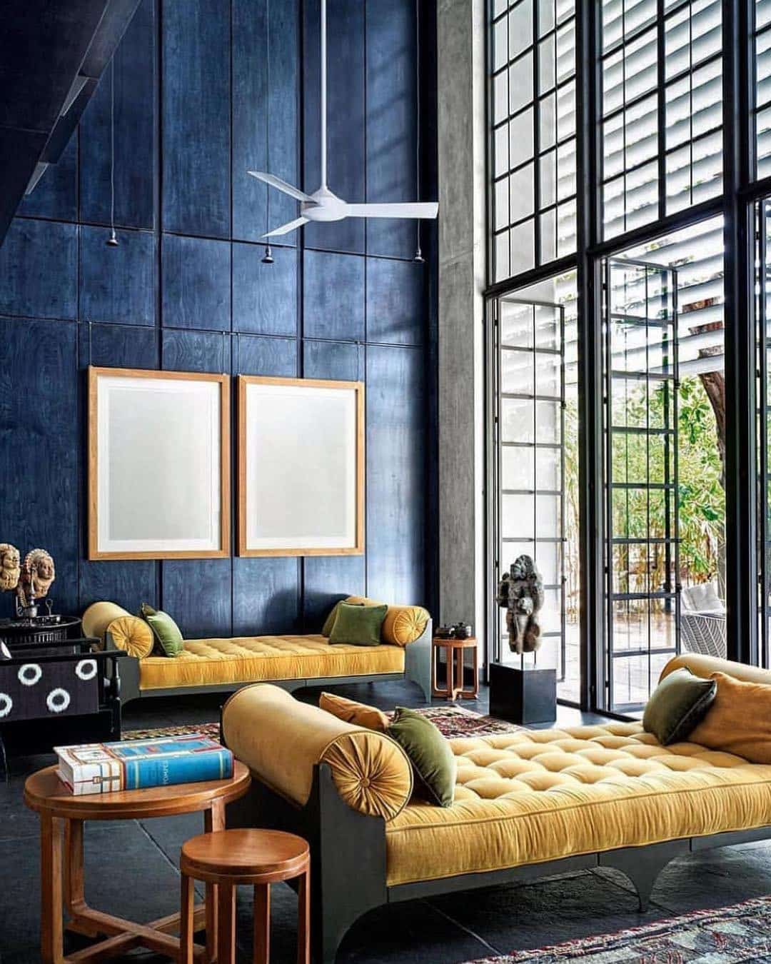 12. Velvet Luxe with Deep Blue Drama - large living room wall ideas