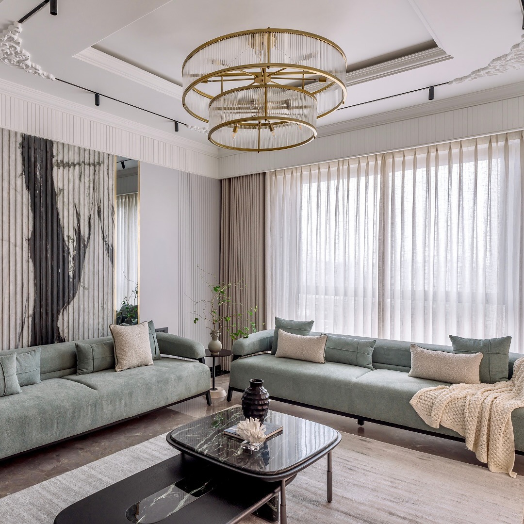 22. Soft Modern Glamour in Sage and Gold - large living room wall ideas