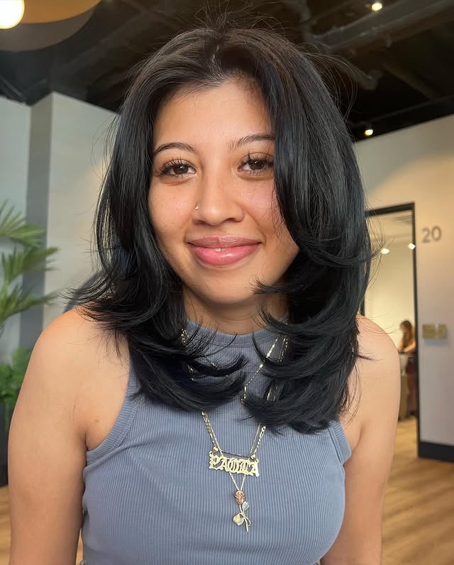 9. Smooth Face-Framing Layers with Jet Black Shine - Short Hair with Layers