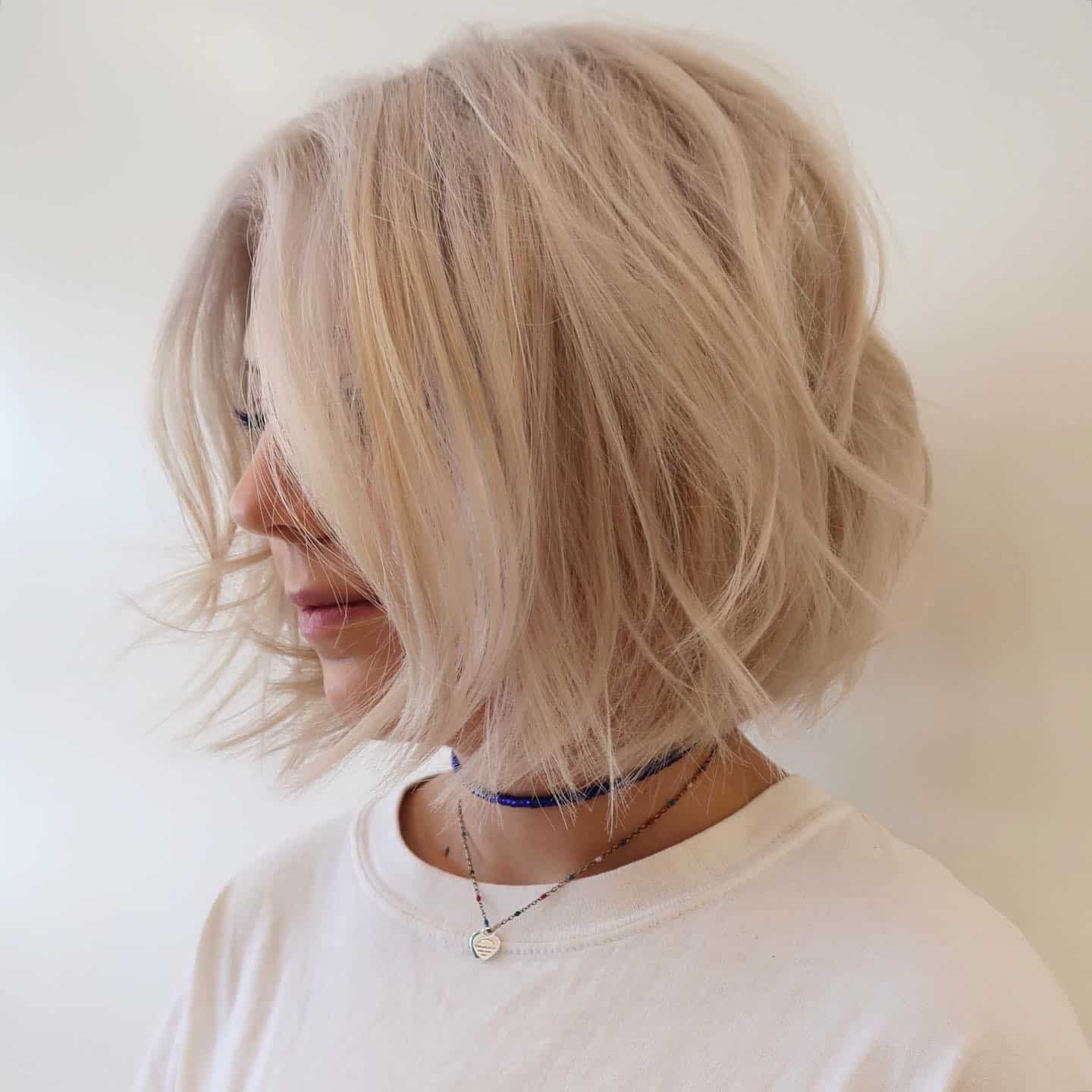 19. Textured Platinum Bob with Tousled Layers - Short Hair with Layers