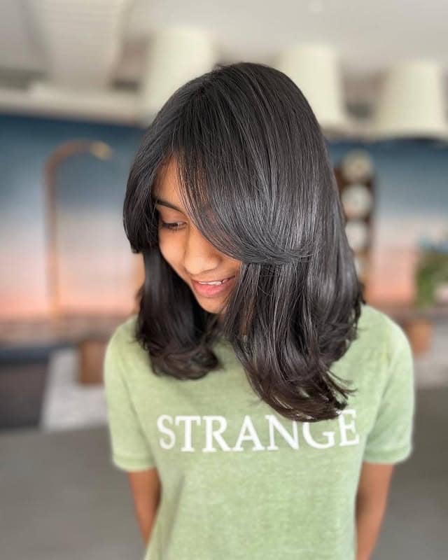 20. Feathered Shoulder Layers with Soft Ebony Flow - Short Hair with Layers