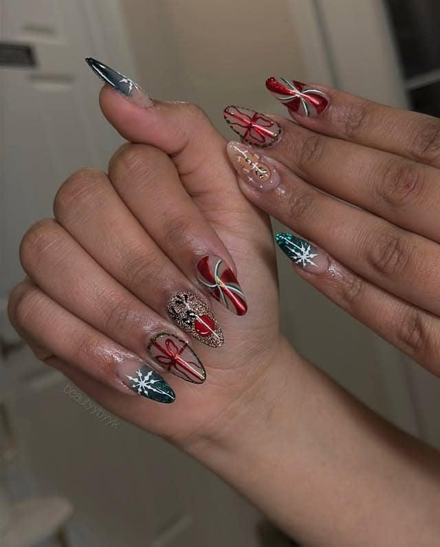 8. Gift-Wrapped Christmas Magic - reindeer nail ideas