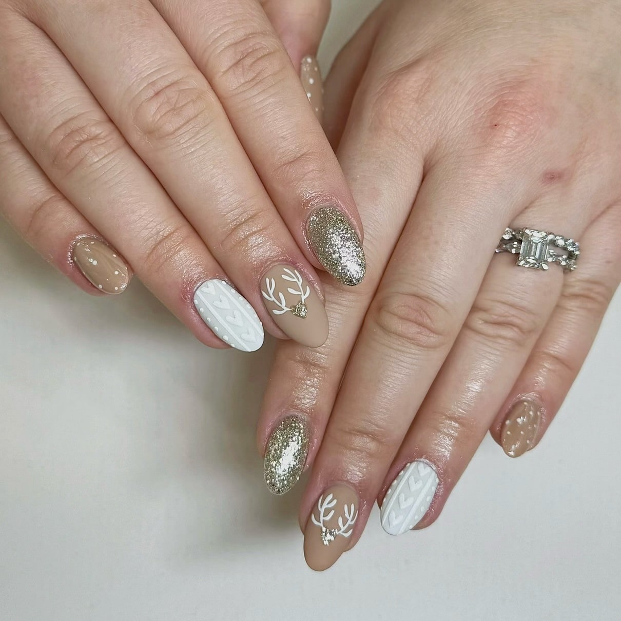 14. Gold & Knit Reindeer Elegance - reindeer nail ideas