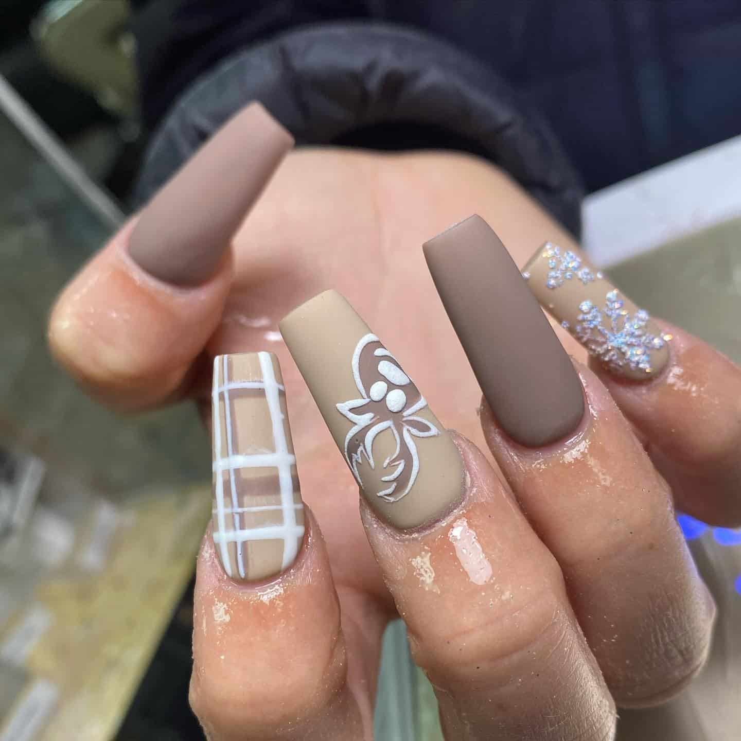 17. Matte Mocha Reindeer Luxe - reindeer nail ideas