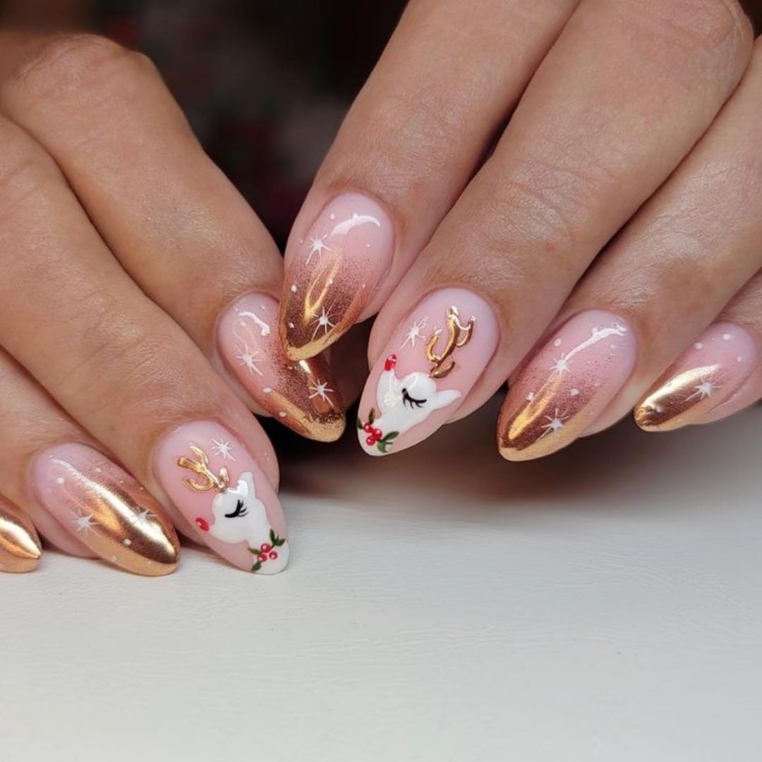 21. Rose Gold Reindeer Glow - reindeer nail ideas