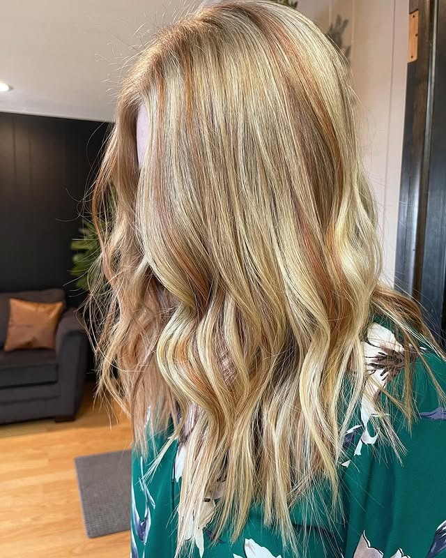 5. Sunlit Strawberry Balayage Waves - Strawberry Blonde Hair Color