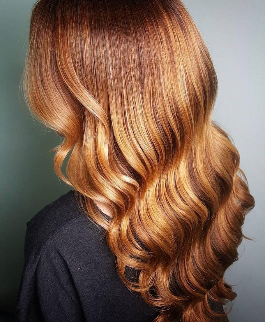 9. Copper Glazed Strawberry Curls - Strawberry Blonde Hair Color