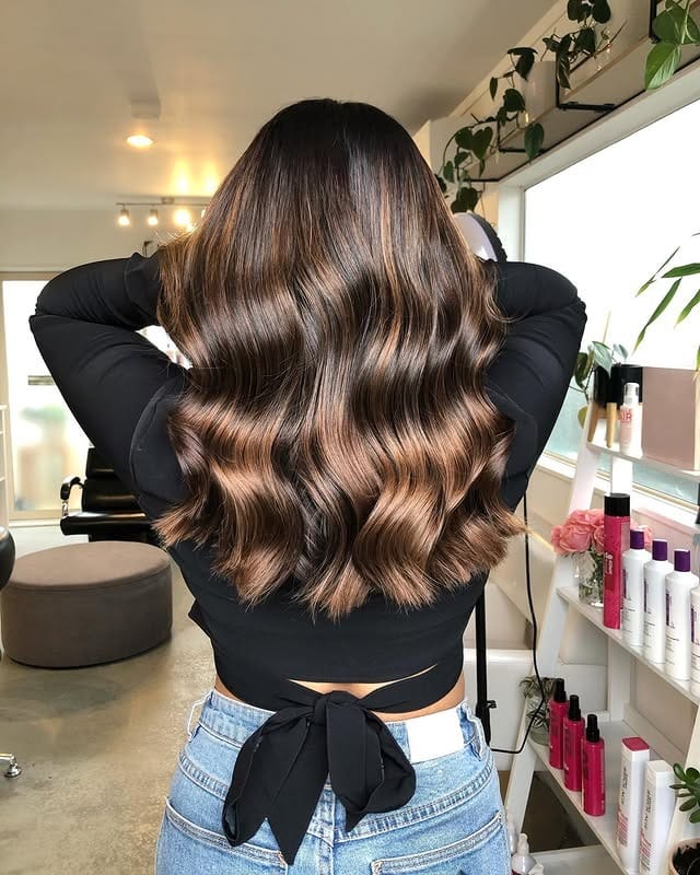 3. Toffee Melt Gloss Waves - Winter Hairstyles