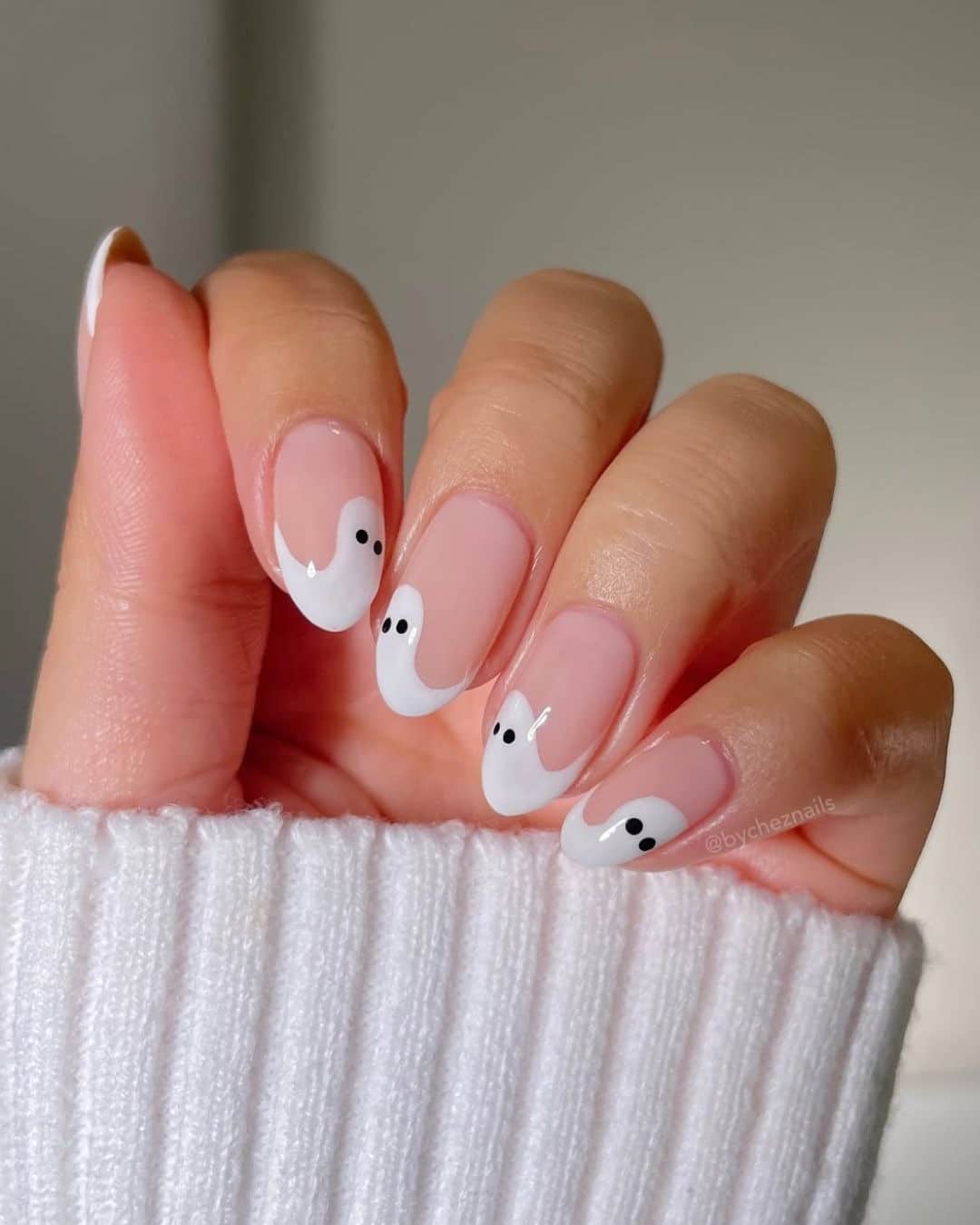 2. Playful Ghost French – White on Nude Base - rounded nail ideas