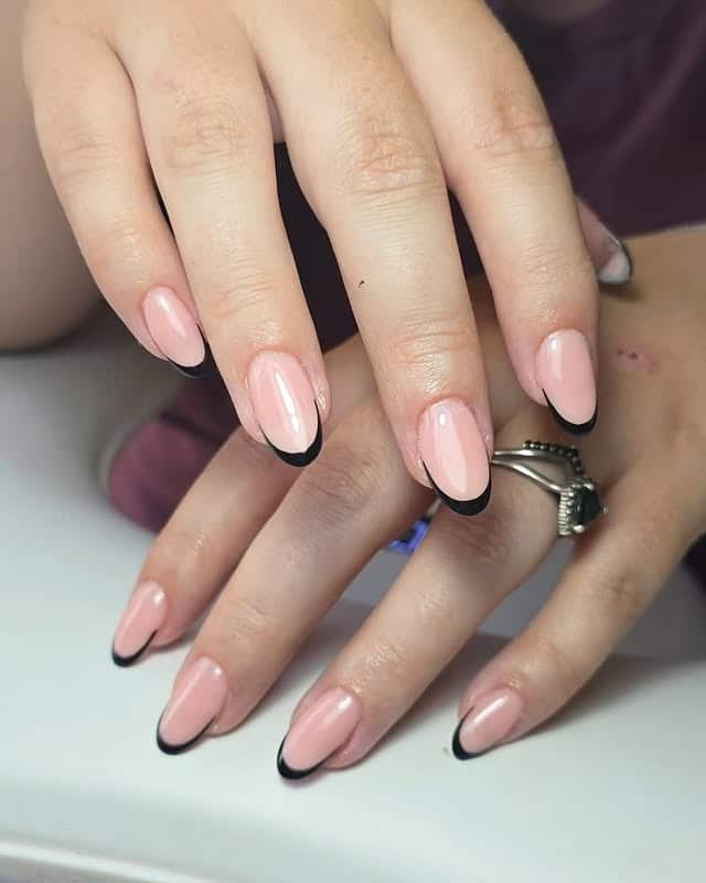 9. Black-Edged Nude – Modern Minimalist French - rounded nail ideas
