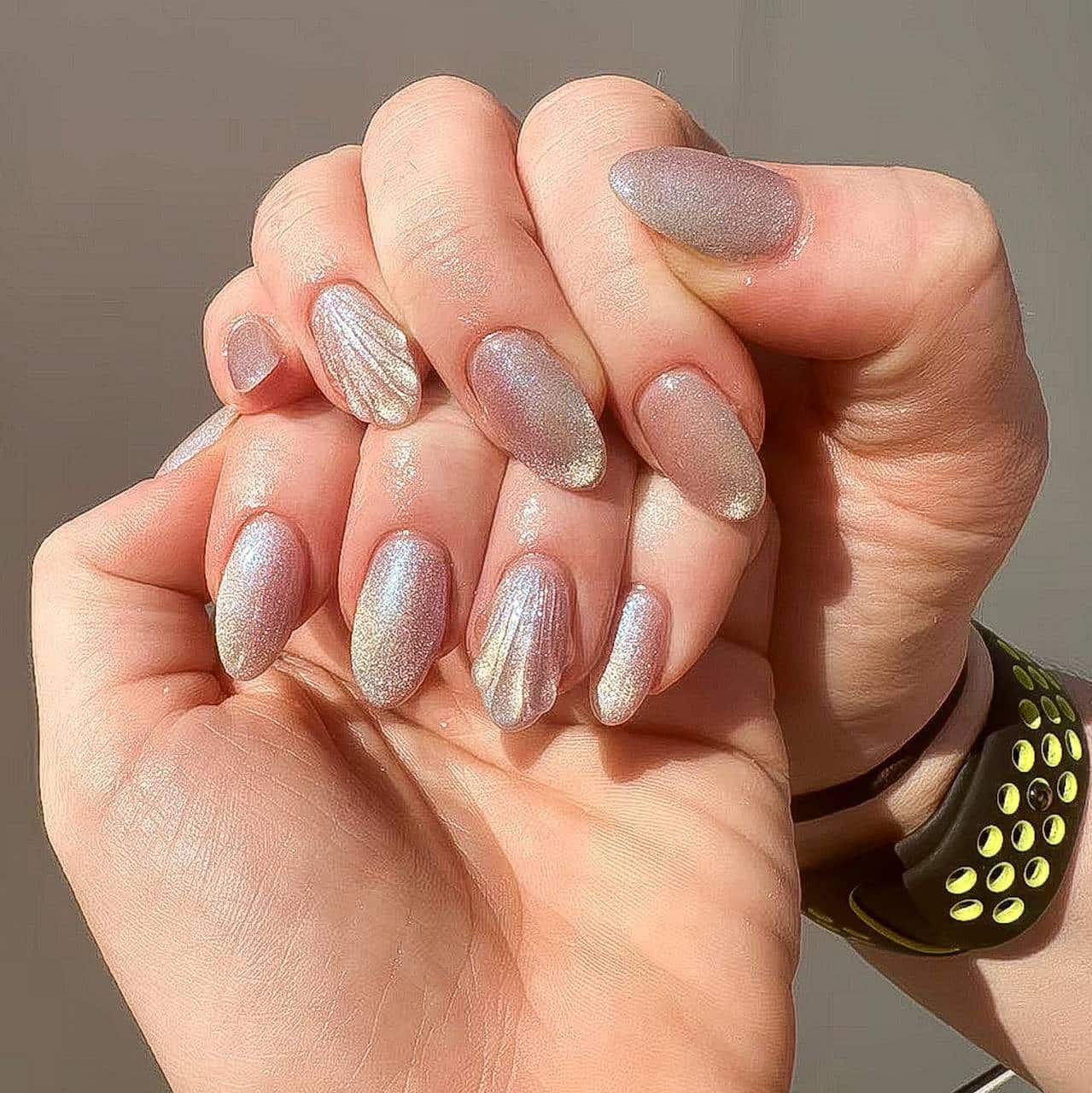 16. Opal Shell – Shimmering Sculpted Finish - rounded nail ideas