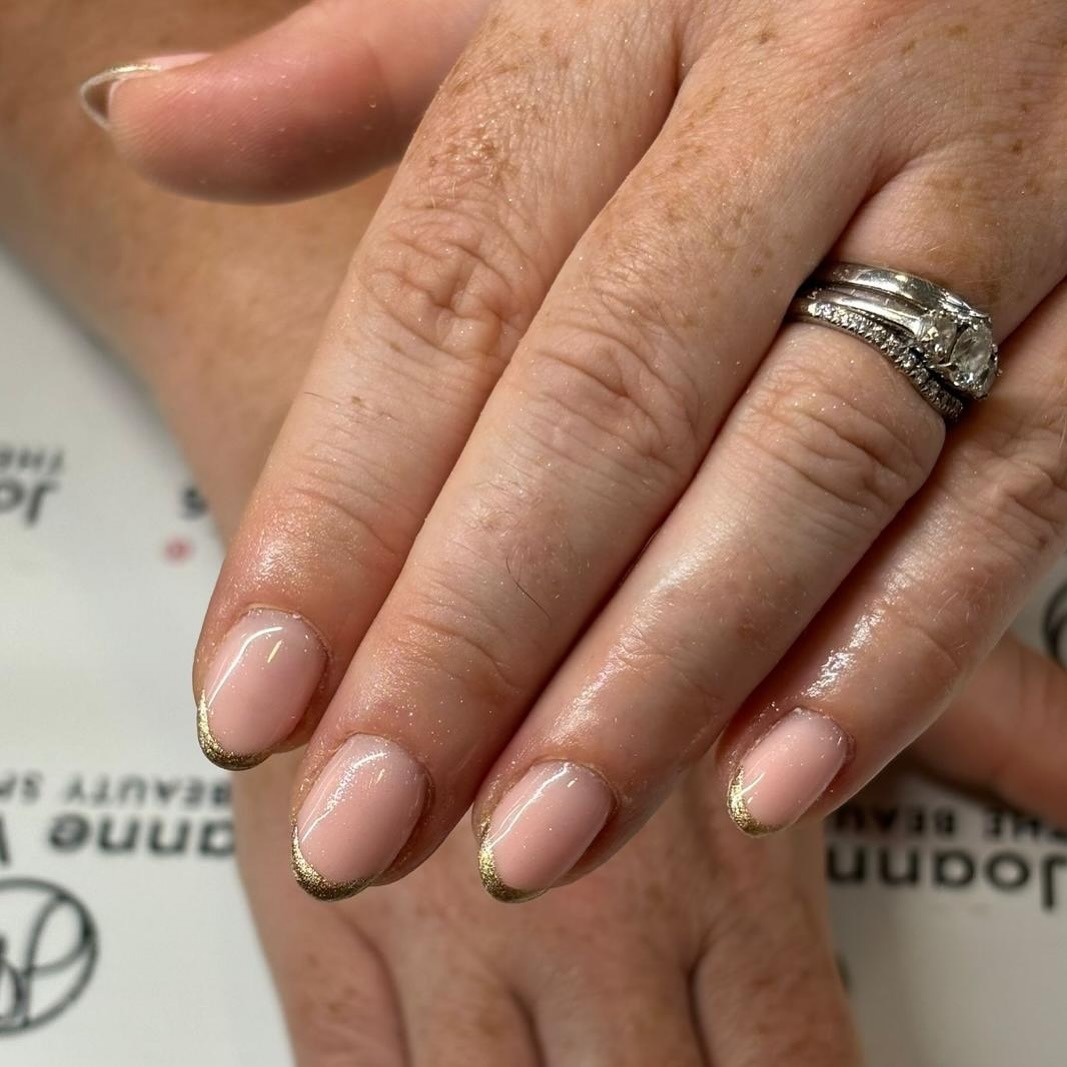 18. Golden Veil French – Nude with Metallic Edge - rounded nail ideas