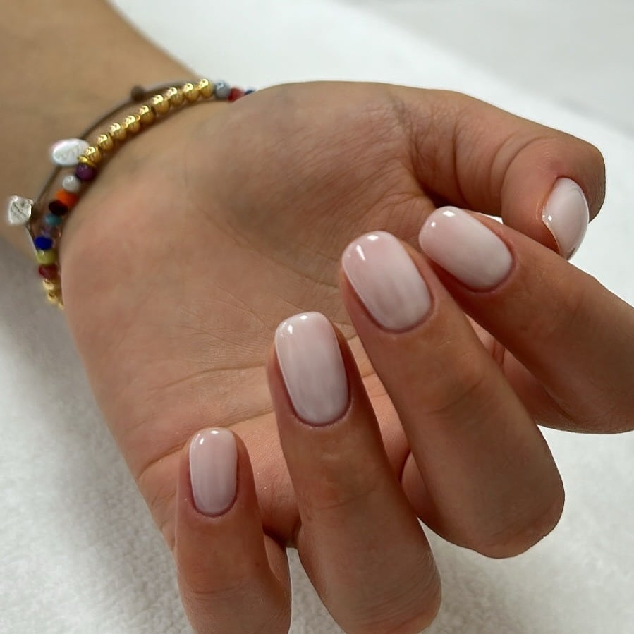 22. Delicate Porcelain Ombre – Creamy White Gradient - rounded nail ideas