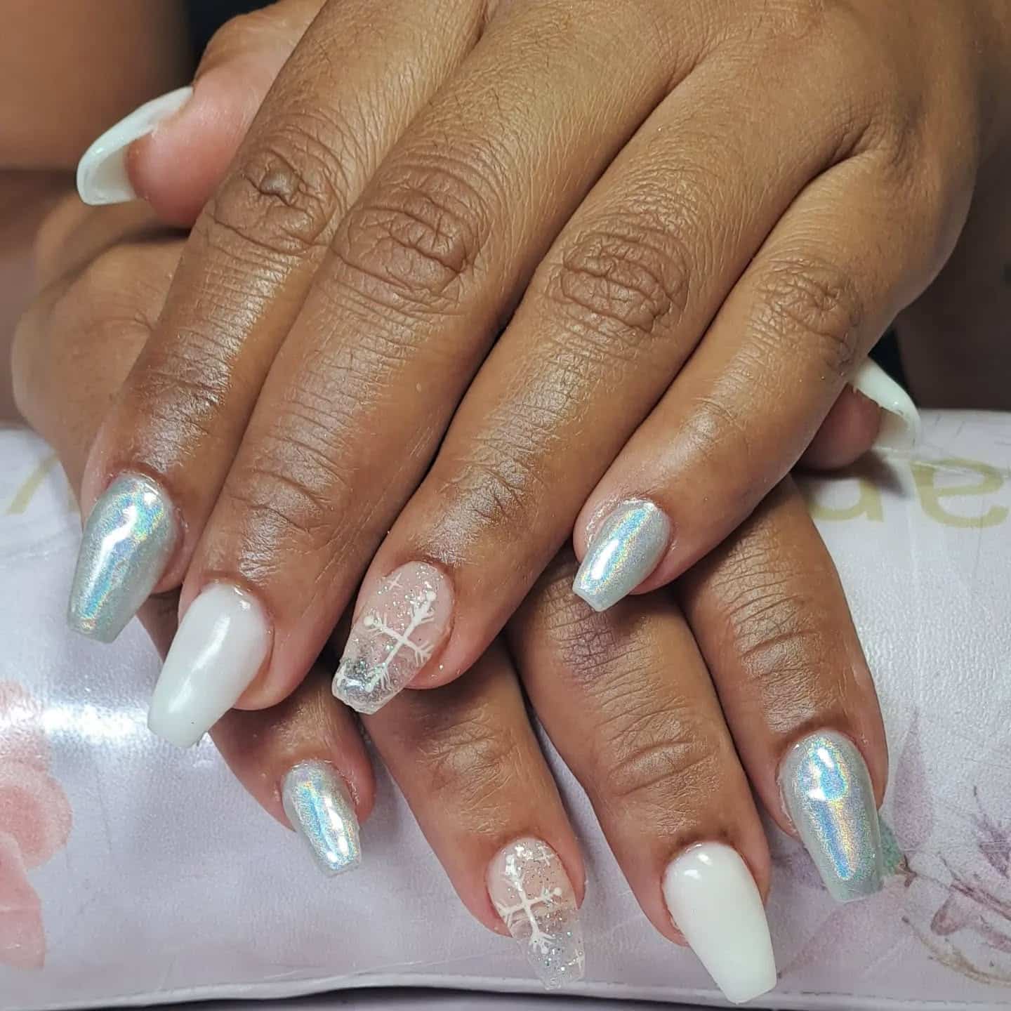 6. Icy Wonderland Chrome - short christmas nail ideas