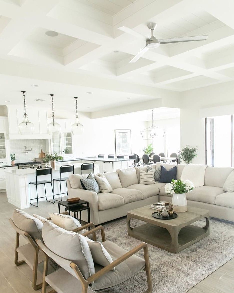 4. Soft Minimalism in Cream and Wood - open concept living room ideas