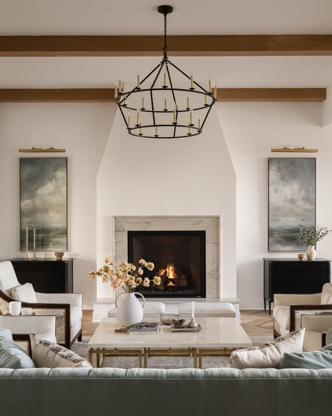 11. Balanced Elegance with Classic Symmetry - fireplace living room ideas