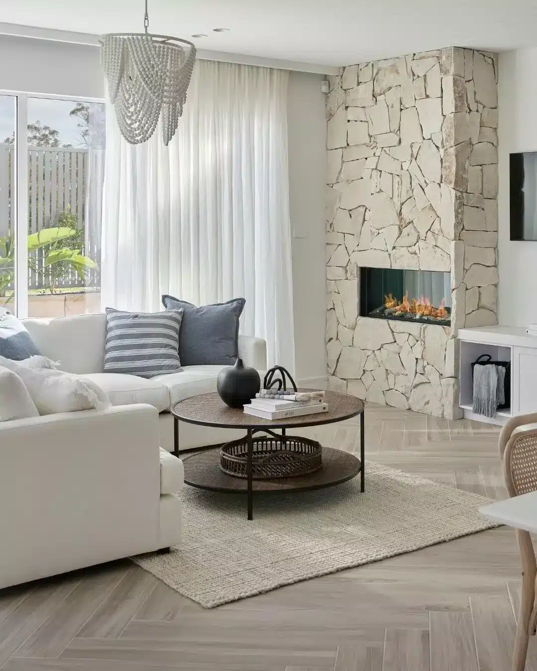 20. Coastal Contemporary Calm - fireplace living room ideas