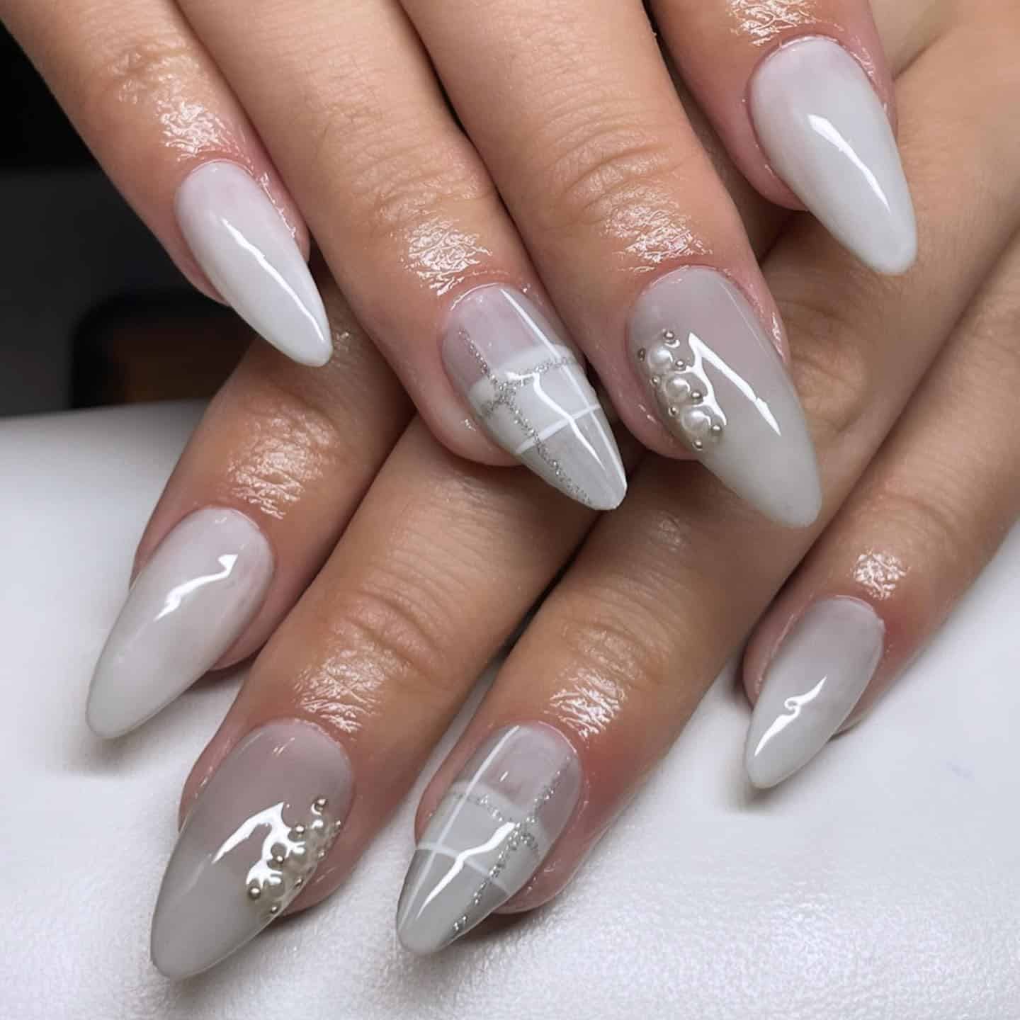 1. Soft Pearl Sheen Nails with Minimal Glam - short rounded nail ideas