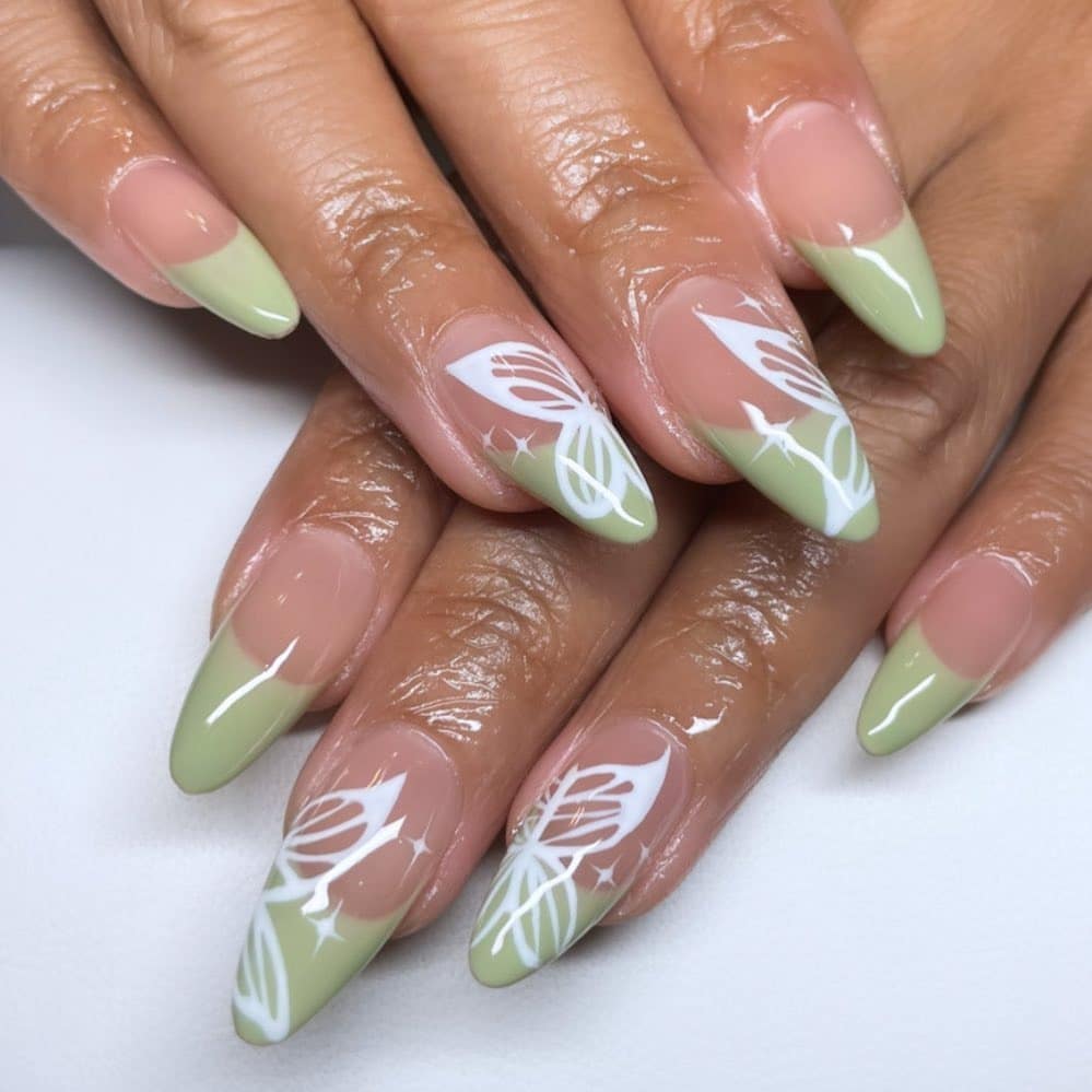 2. Sage French Tips with Butterfly Detail - short rounded nail ideas