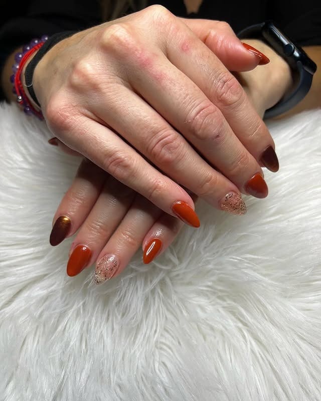 5. Autumn Glow Mix with Glitter Touch - short rounded nail ideas