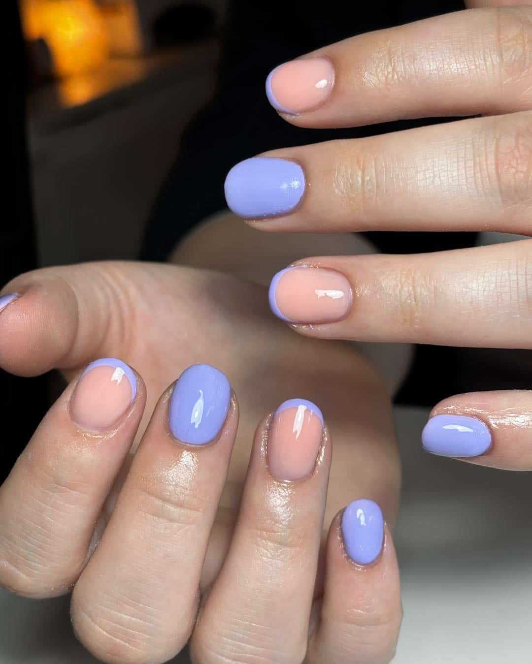 7. Lilac and Nude Color Block French - short rounded nail ideas