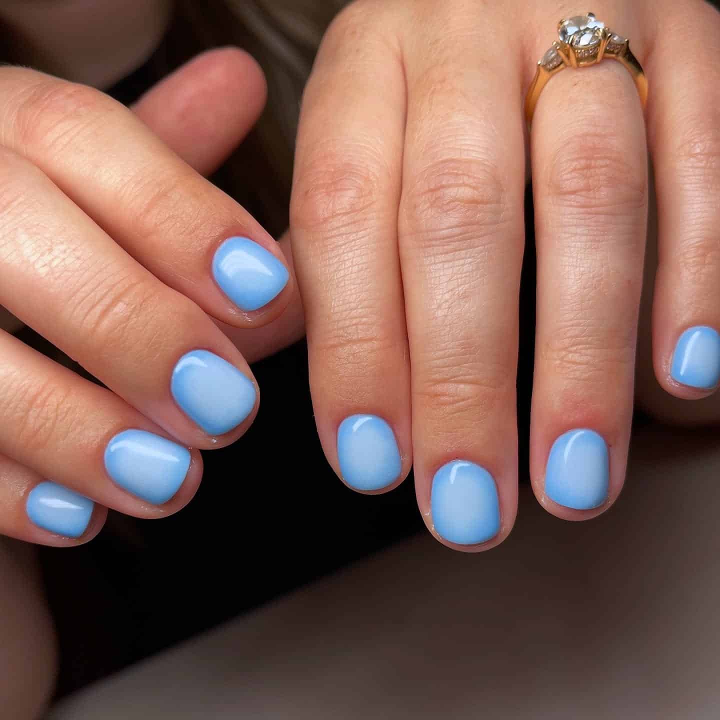 16. Powder Blue Gloss Nails - short rounded nail ideas