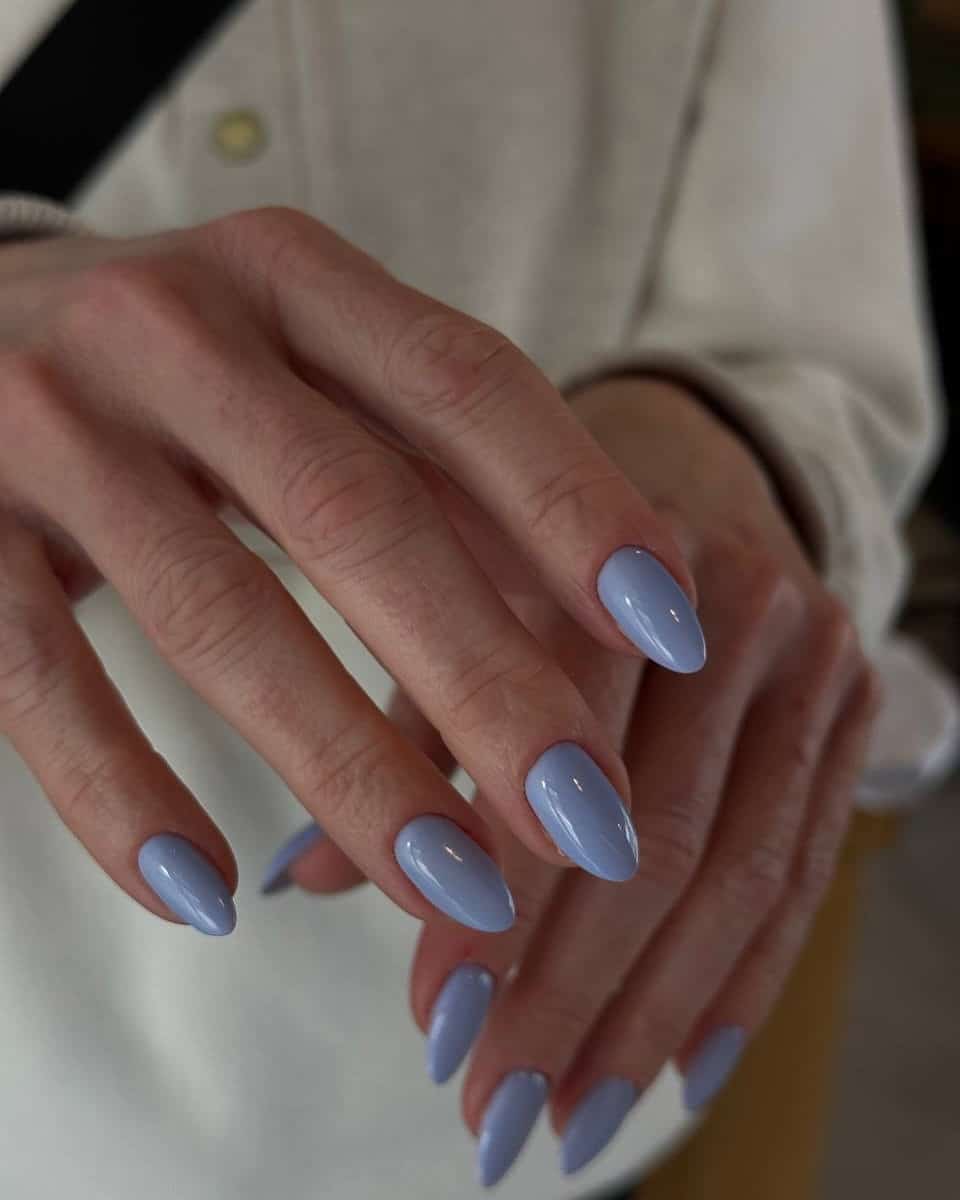 17. Periwinkle Shine Short Almond Nails - short rounded nail ideas