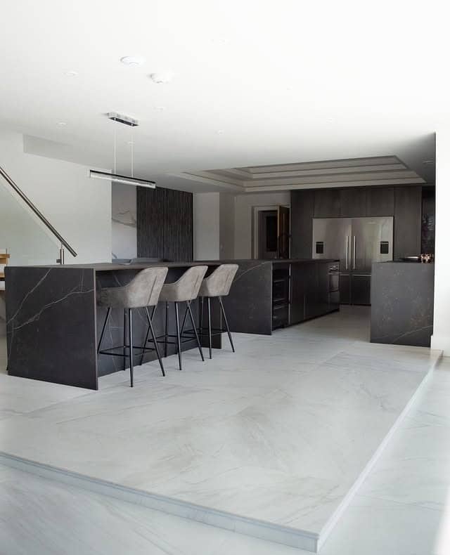 20. Grey Marble Sophistication with Elevated Layout - white kitchen floor ideas