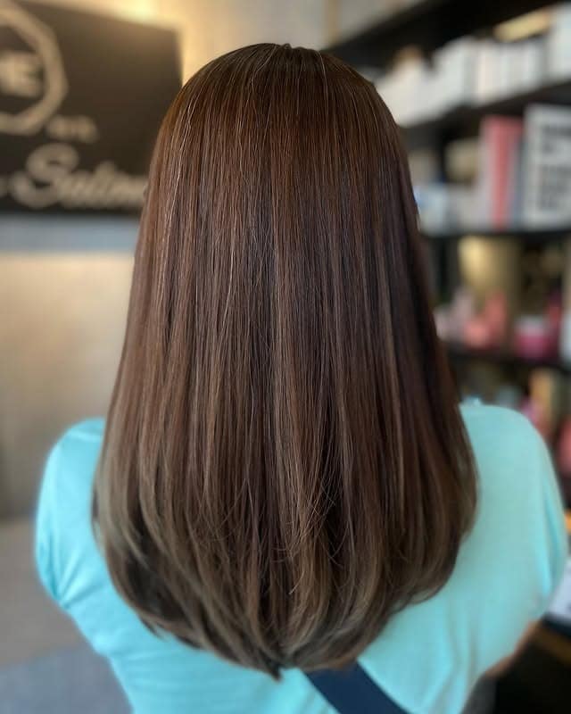 8. Silky Medium Brown Layers with Natural Flow - Medium Brown Hair Color